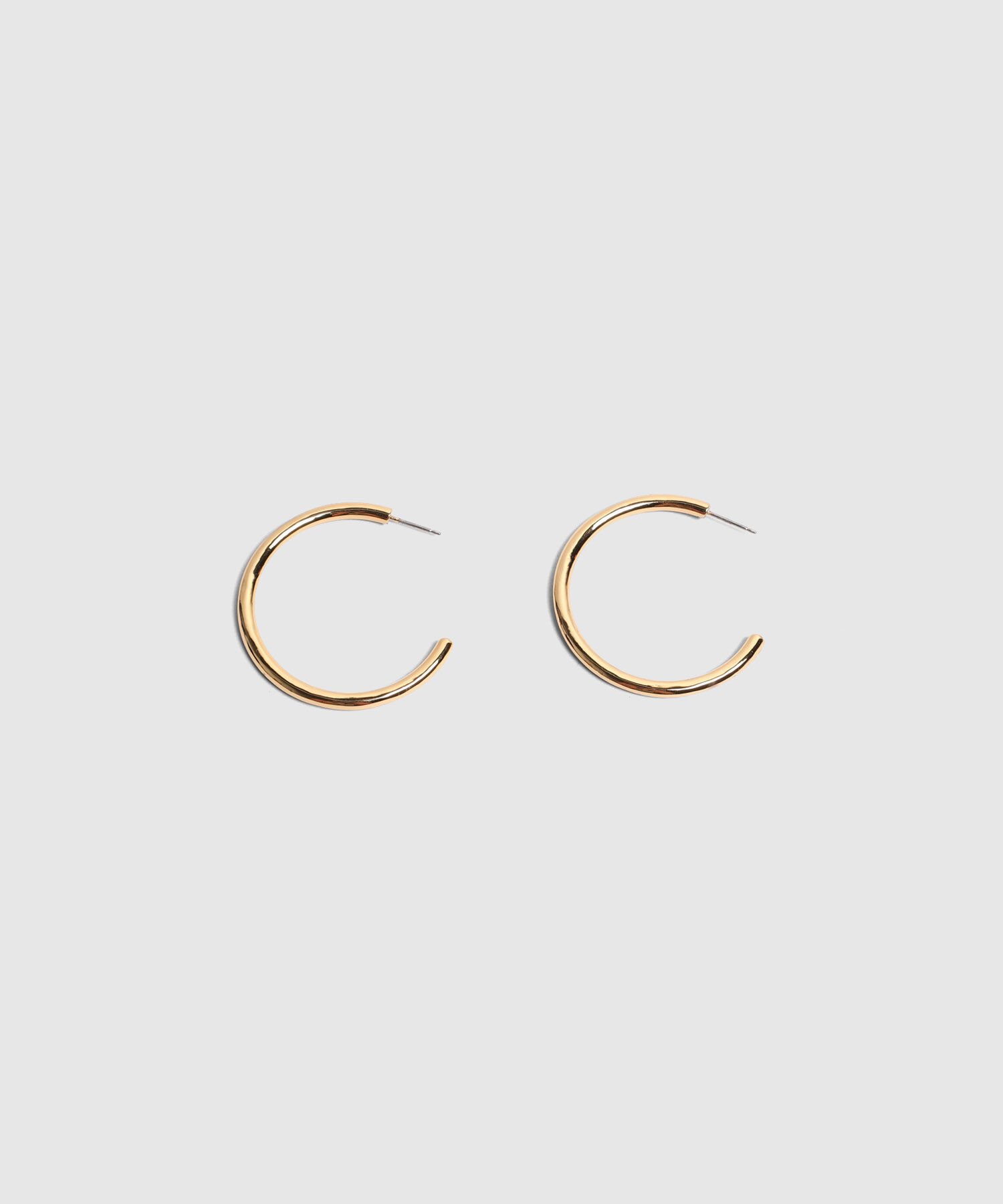 Aretes Grandes De Silueta Tubular Mujer